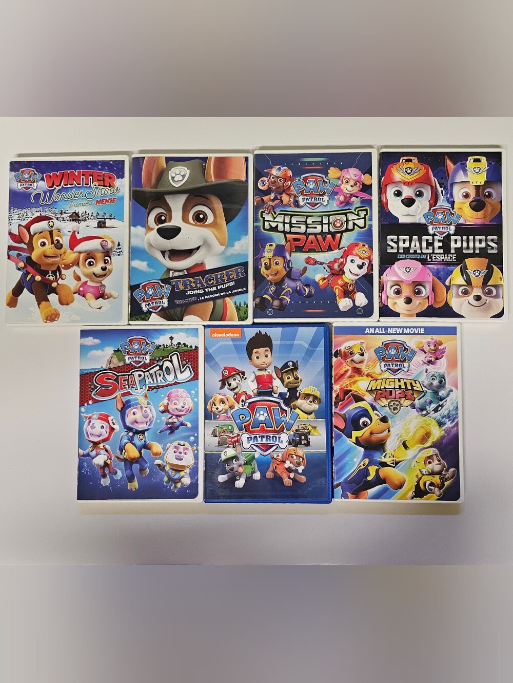 PAW Patrol Kids DVD Bundle Lot of 7 Mighty Pups Space Sea Mission Winter